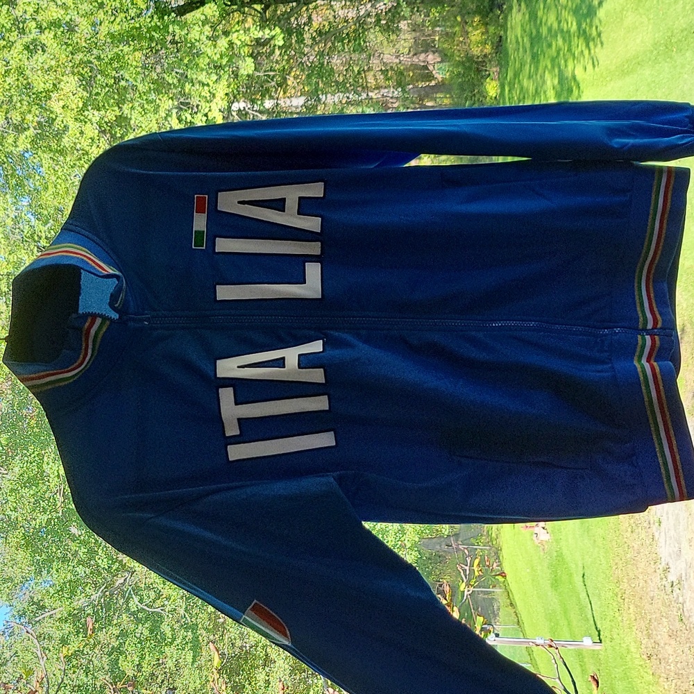 Never worn genuine Italian cloth bomber jacket purchased in Italy